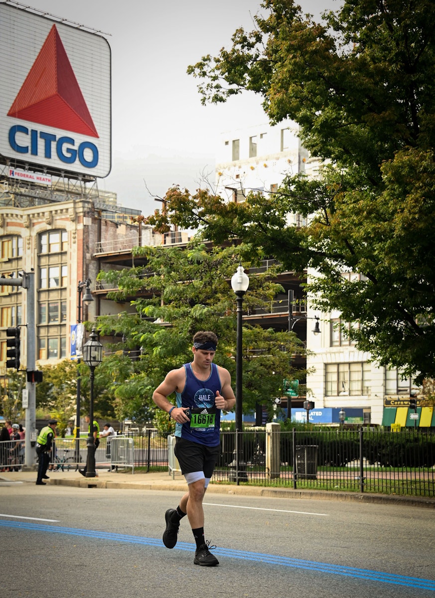 Michael running by the Citgo sign in the Boston Marathon